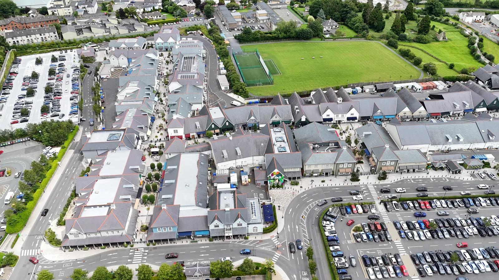 Kildare Village outlet shopping village in Kildare, Ireland seen from the air